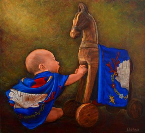 Nipotino con cavallino di legno e colori dellla contrada del nicchio di Siena